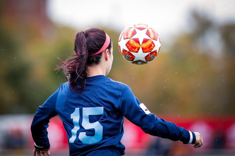 Young girl playing soccer