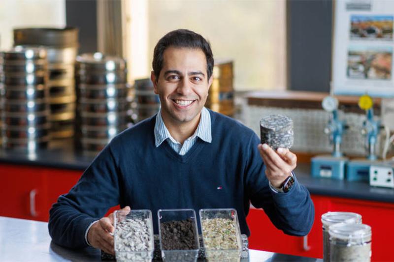 Ehsan Yaghoubi holding up sample.