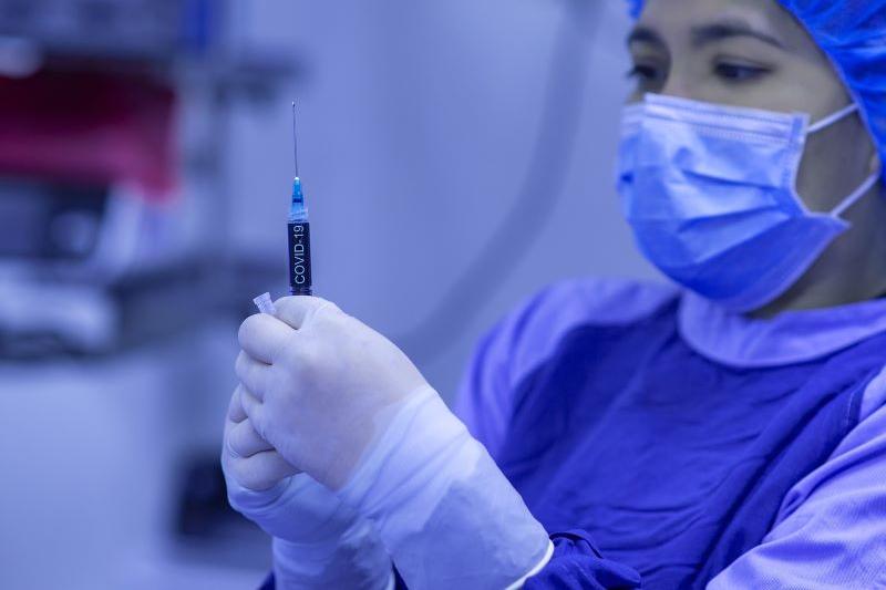  Nurse giving a COVID vaccine