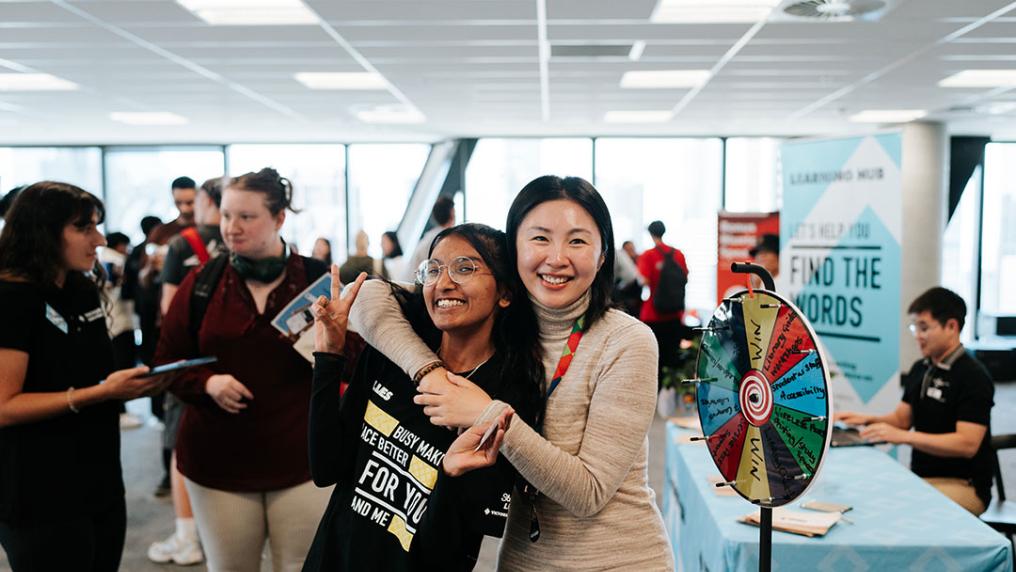 Two girls posing at City campus Ofest.